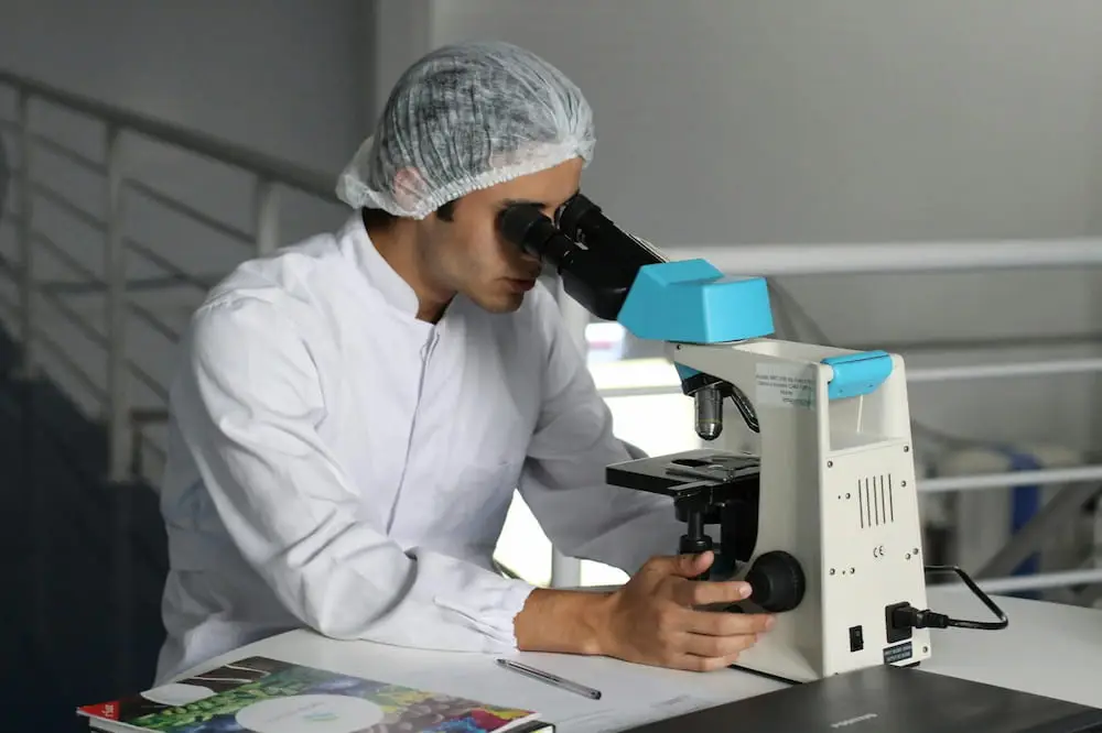 doctor determining whether alcohol is a disease